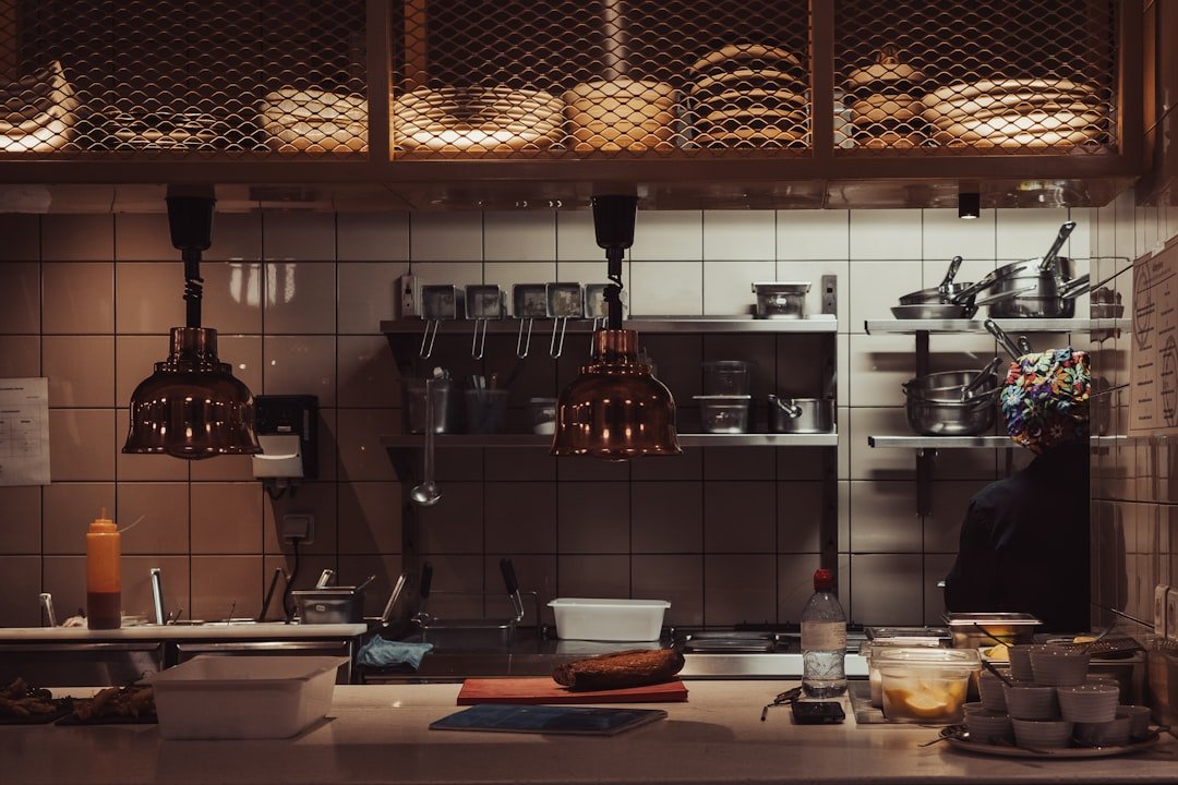 a-kitchen-filled-with-lots-of-pots-and-pans-pkkbvleomz0